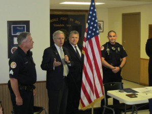 John takes part in an awards ceremony at the Urbandale Police Department